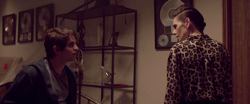 Adrienne Wilkinson as Josephine Tully with Zachary Gordon in Dreamcatcher leopard skin crowbar