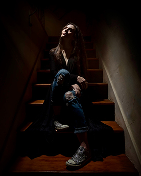 Adrienne Wilkinson Shawn Keehne under the light stairs